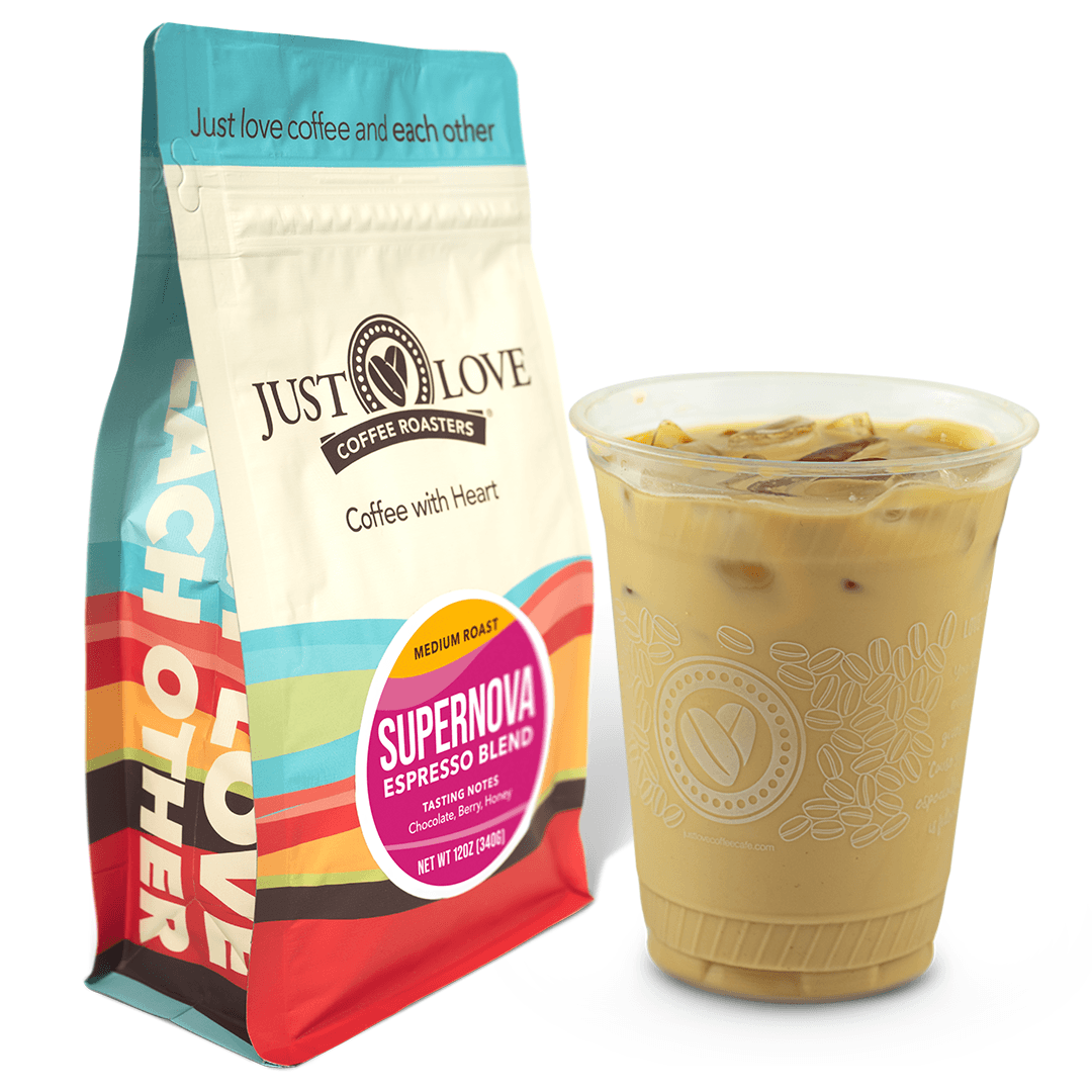 Just Love Coffee Cafe Berea Coffee Club Image with a bag of Just Love Coffee Roasters Supernova and an iced latte.